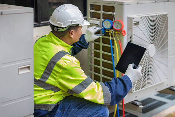 Professional Air Conditioning Repair technician working in Hye, TX